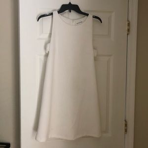White cutout dress. Perfect for bridal shower!